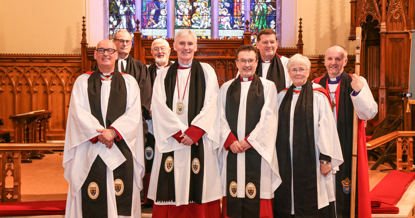 At the service of installation of the new Archdeacon of Dalriada in Lisburn Cathedral on March 4, are members of the Chapter of St Saviour, Connor. From left: the Ven Dr Stephen McBride, Archdeacon of Connor; the Rev Canon William Taggart, Registrar; the Rev Canon John Budd; the Very Rev Sam Wright, Dean of Connor; the Ven Paul Dundas, Archdeacon of Dalriada; the Rev Canon James Carson; the Rev Dr Pat Mollan, the Church’s Ministry of Healing: The Mount, who was guest speaker; and the Rt Rev Alan Abernethy, Bishop of Connor. Photo by Norman Briggs (RnBphotographyni).
