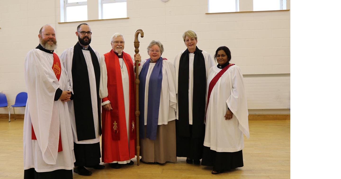 Deacons with Bishop Harold Miller and preacher Dr Christina Baxter.