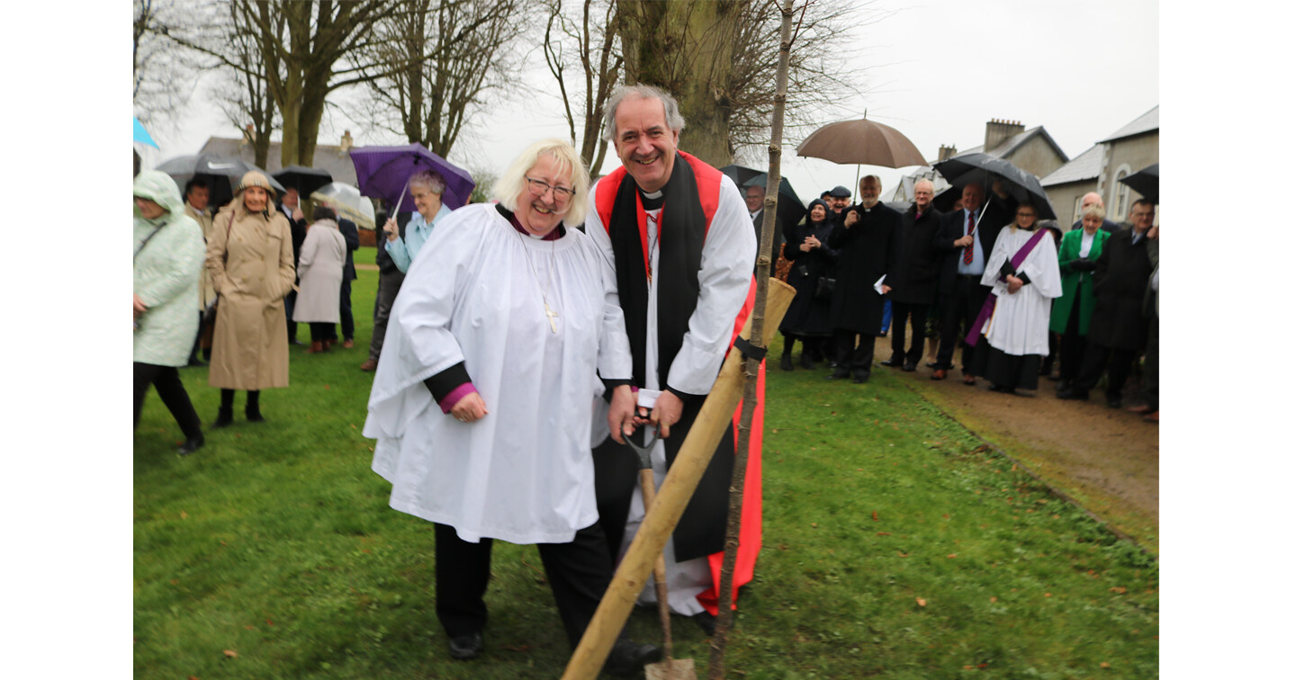 Bishop Sarah Groves, from Gracehill Moravian Church, and Bishop Michael Burrows, representing the Church of Ireland, at the tree–planting in Gracehill Village Square.