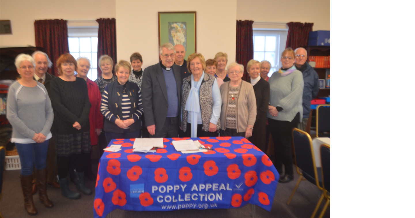 The Rector of Macosquin Parish, the Rev Canon Mike Roemmele, with some members of the Macosquin Poppy Appeal team.