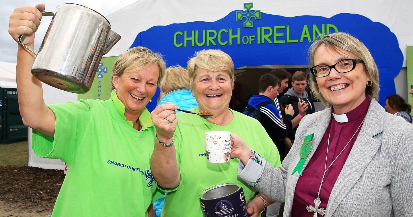 (l to r) Vanda Fryday, Helen Elliott & Bishop Pat Storey offer a welcome at the Church of Ireland stand last year (2017).