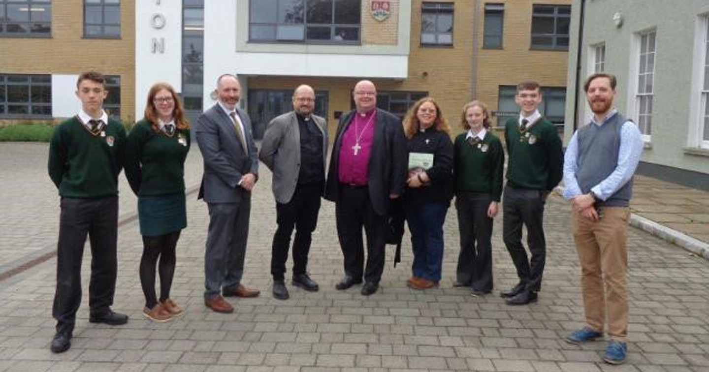 The group from Lichfield Diocese joined the Bishop on a visit to Ashton School. Left to right: Martin, Ellie, Mr Adrian Landen (Principal), the Reverend Simon Douglas, the Bishop, the Reverend Julia Coady, Alison, Mark, and Drew Ruttle (School Chaplain).