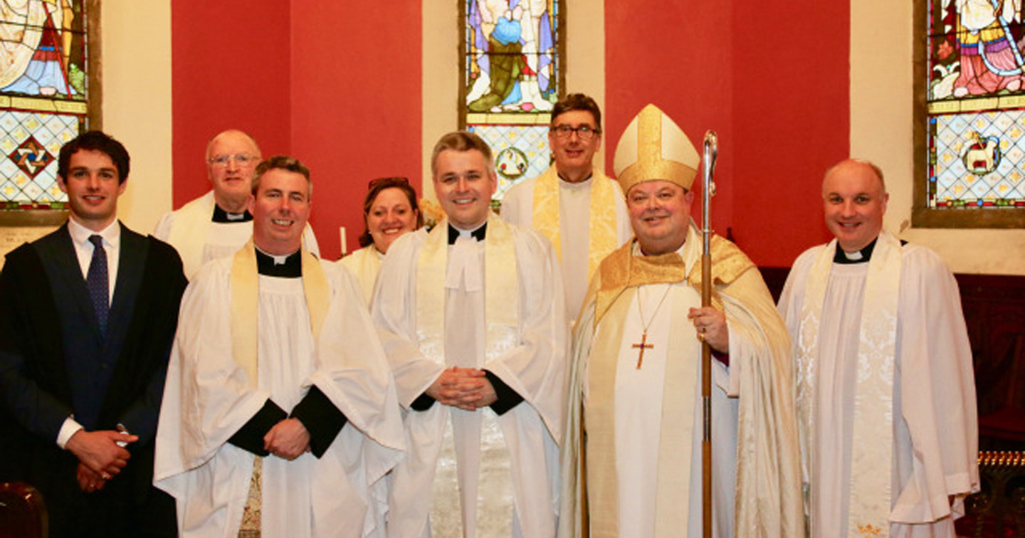 Photographed after the Institution in Cobh and Glanmire were (left to right) John C. Jermyn (Assistant Diocesan Registrar); the Reverend Tony Murphy (Rural Dean); the Reverend David McDonnell (Preacher); the Reverend Elaine Murray (Bishop’s Chaplain); the Reverend Paul Arbuthnot (Incumbent of Cobh and Glanmire); the Very Reverend Nigel Dunne (Dean of Cork); the Bishop; and the Venerable Adrian Wilkinson (Archdeacon of Cork, Cloyne and Ross).