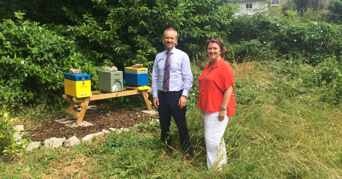 Mr David Ritchie, Chief Officer and Secretary General, and Ms Fern Jolley, Property Officer, with the Representative Church Body’s new bee hives.