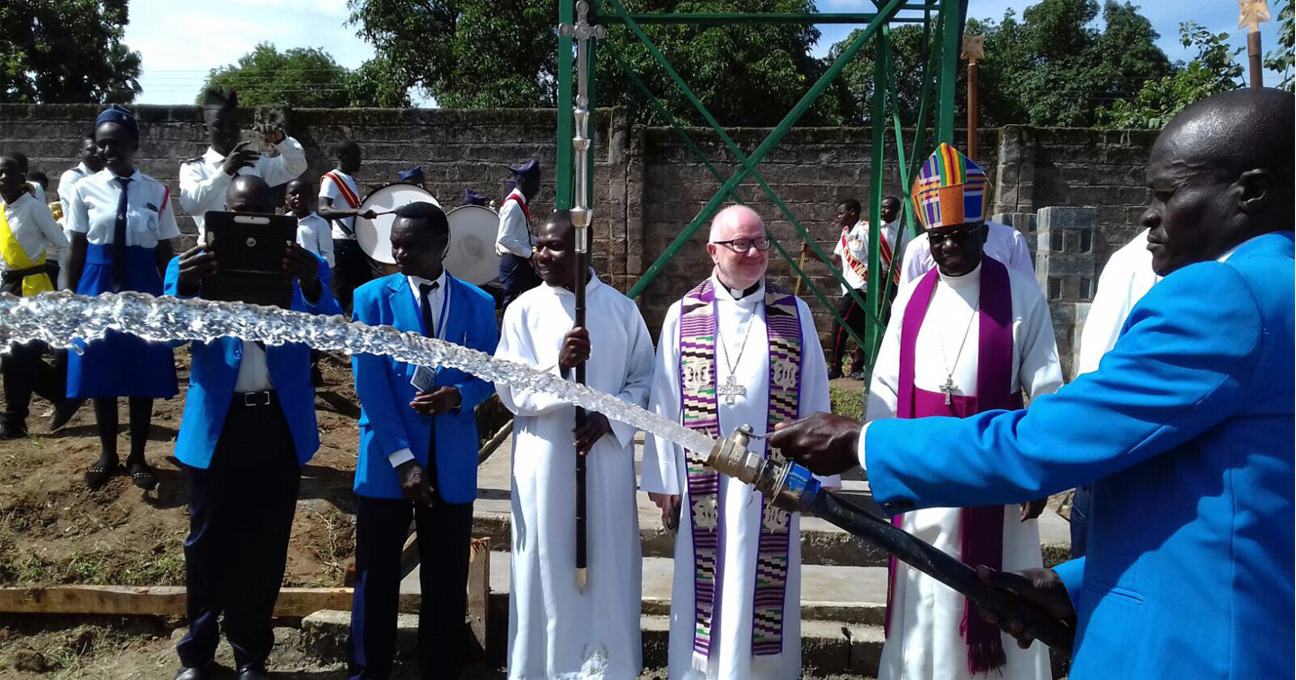 Archbishops Clarke and Chama after the blessing of the new borehole at Buchi. Photo (c) CMS Ireland