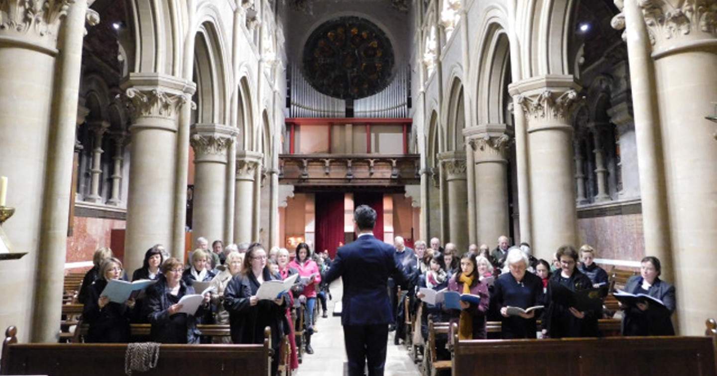 St Fin Barre’s Cathedral, Director of Music, Peter Stobart, rehearses with some of those who took part in ‘Come and Sing’.