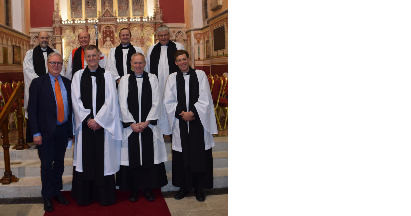 Front row (left to right): the Revd Ken Gibson, the Revd Richard Waller, the Revd Richard Beadle, the Revd Simon Scott. Back row (left to right): Dean Nigel Crossey, Bishop Ferran Glenfield, The Ven Craig McCauley, The Ven Isaac Hanna.
