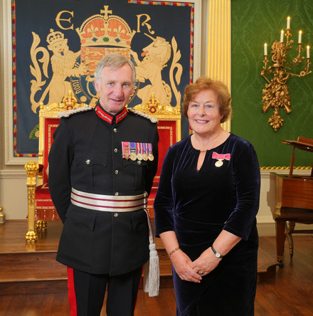 Disability champion receives British Empire Medal for committed service