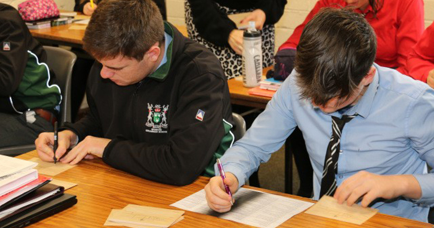 Students from Bandon Grammar School writing some of the c. 4,200 First World War telegrams.