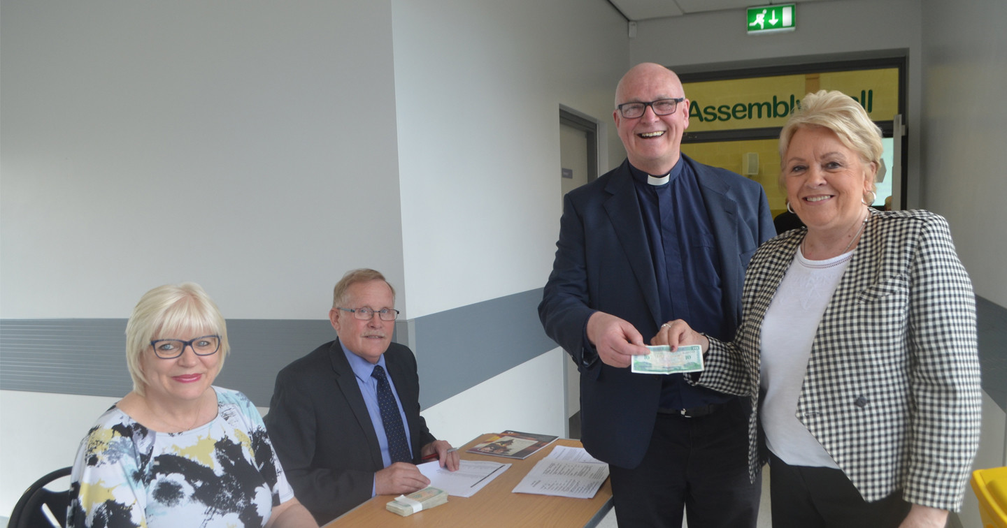 Faughanvale parishioner Ann Turner (right) collects her ten pound note for St Canice's Church's ‘You’ve Got Talent’ initiative. Included (left to right) are church wardens Elaine Way and David Holmes, and local Rector, the Rev Canon Paul Hoey.