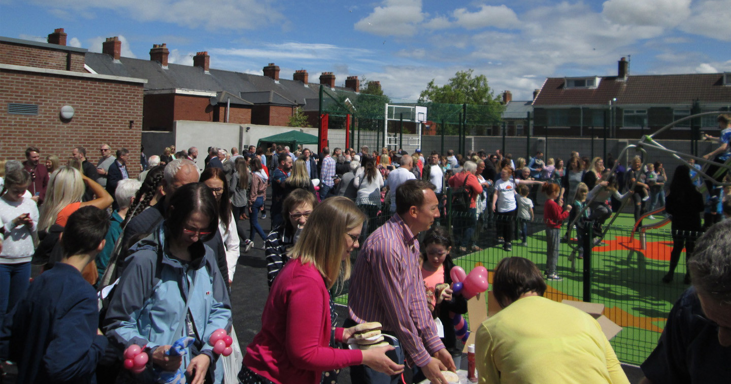 Families enjoy the barbecue and play facilities in the U-Turn Project, at the back of the halls.