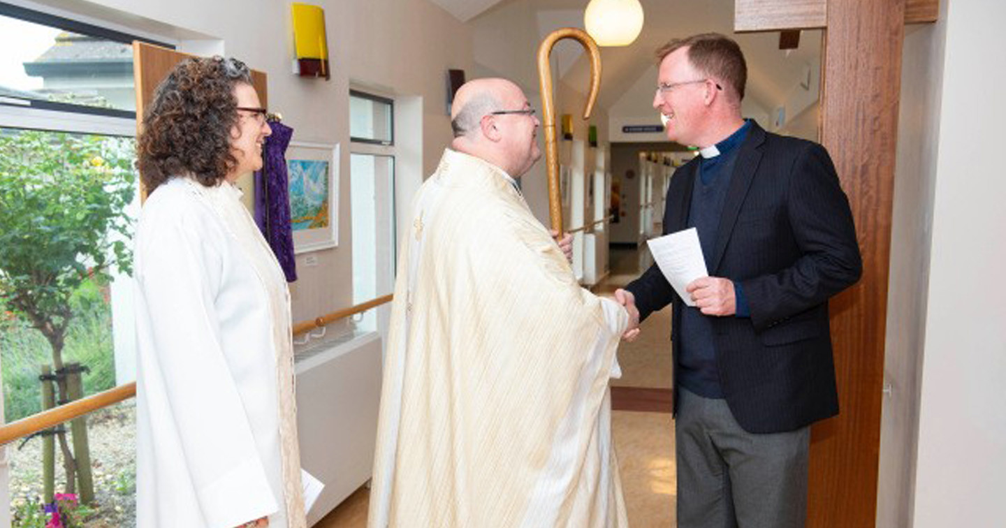 The Reverend Sarah Marry and the Bishop greet the Methodist Minister, the Reverend Andrew Robinson. Photography by Gerard McCarthy.