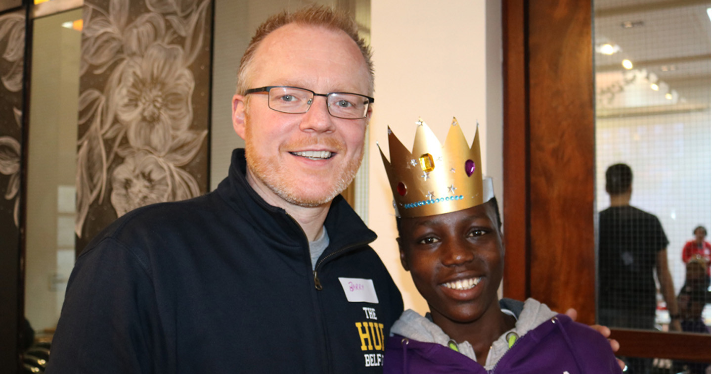 The Rev Barry Forde with Isaac, a member of the Abaana New Life Choir, who is sponsored by the Hub.
