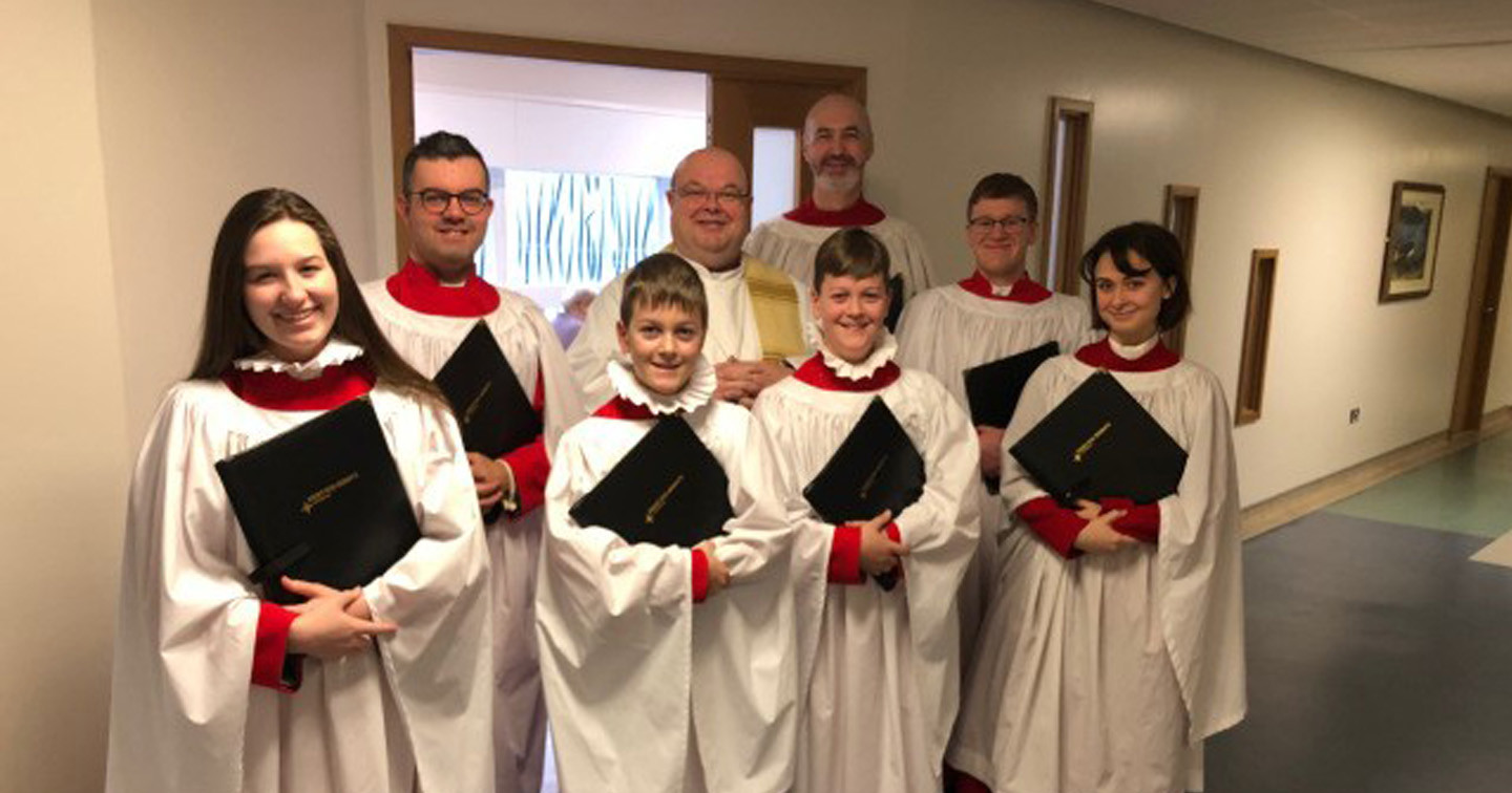 Some members of the choir, under the direction of Peter Stobart, with Bishop Colton, before the Service.