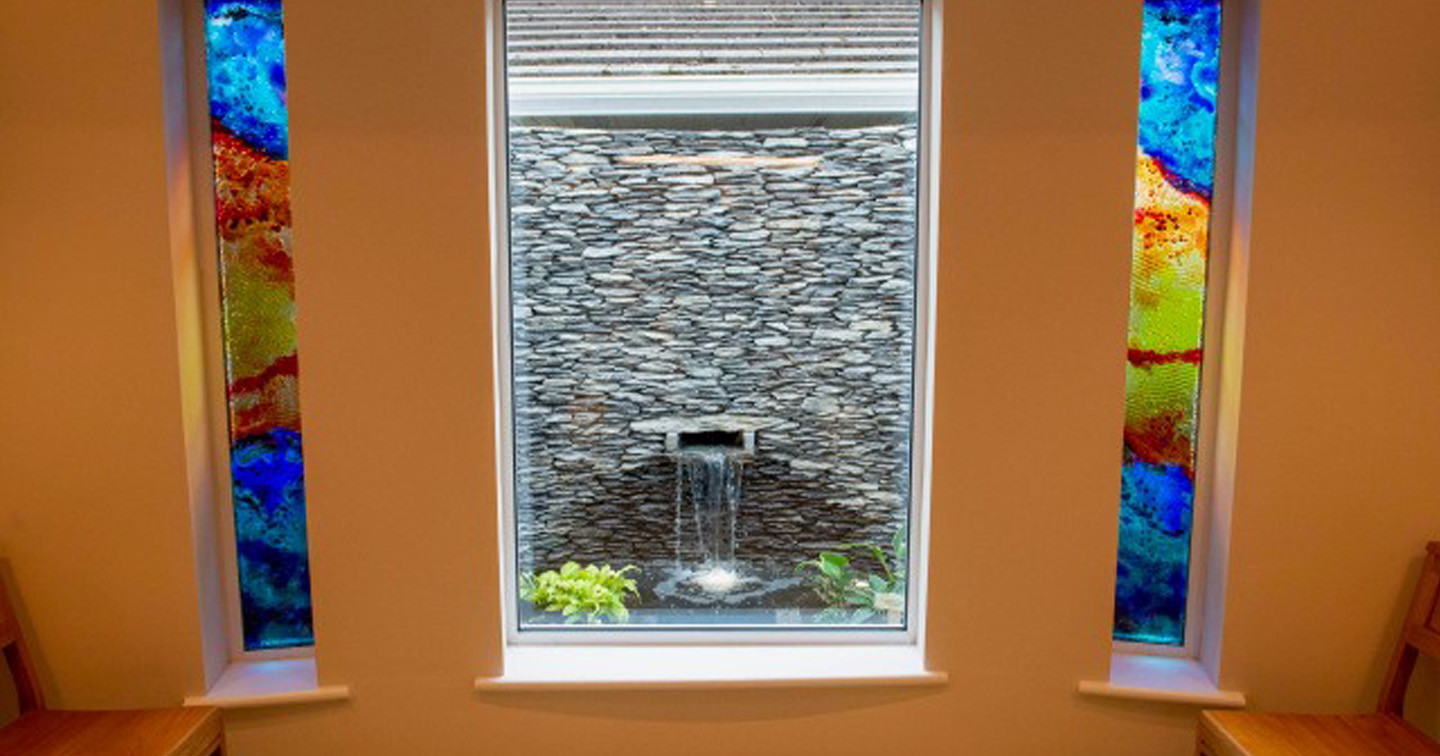 Garden and water feature with stained glass by Eoin Turner. Photography by Gerard McCarthy.
