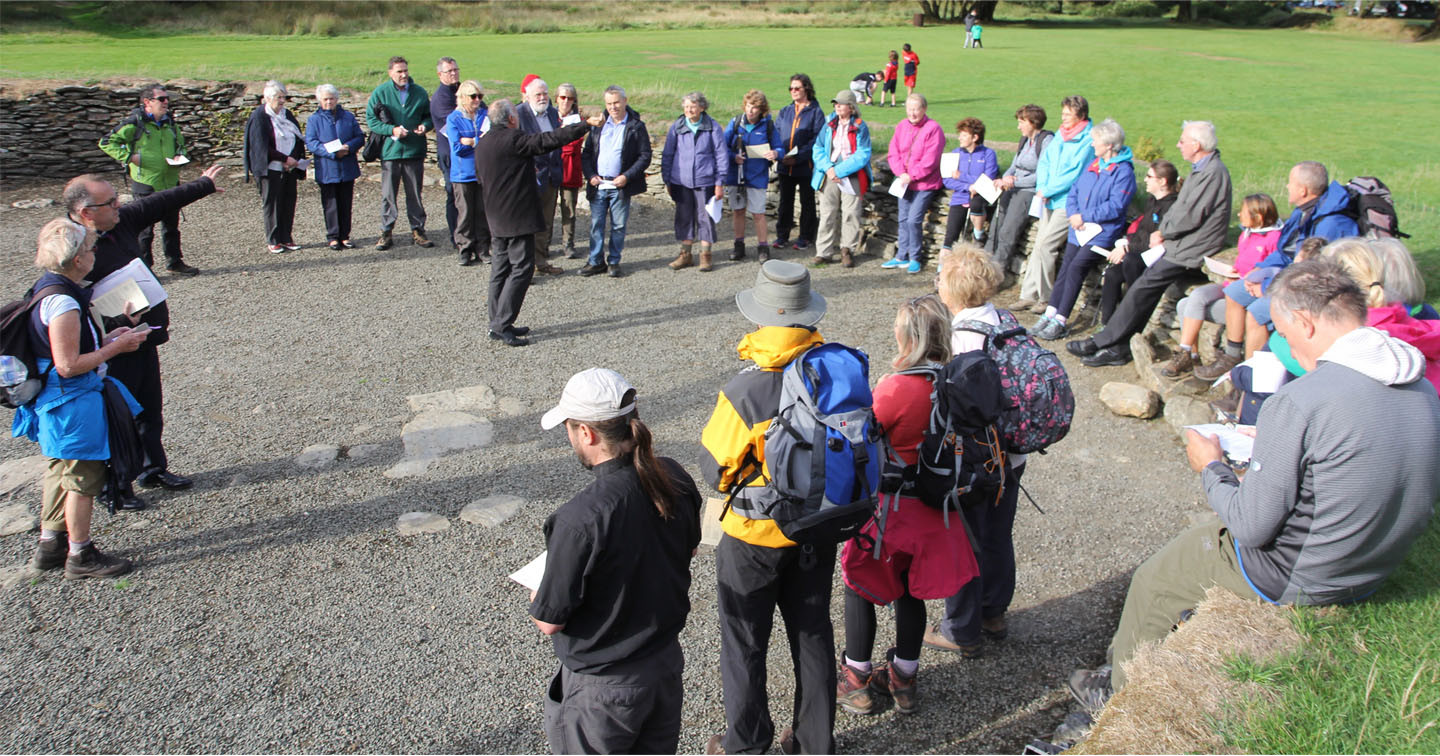 Pilgrims gather at Glendalough's Upper Lake for a short service at the end of the Camino de Glendalough.