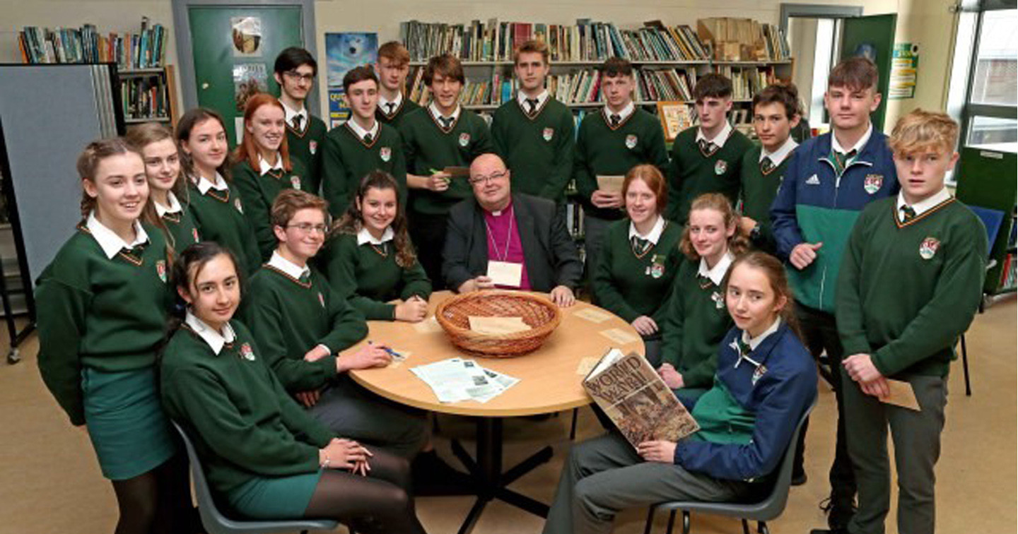 Bishop Paul Colton with students from Ashton School who wrote telegrams as part of the commemorative events to mark the centenary of Armistice Day. Picture: Jim Coughlan.