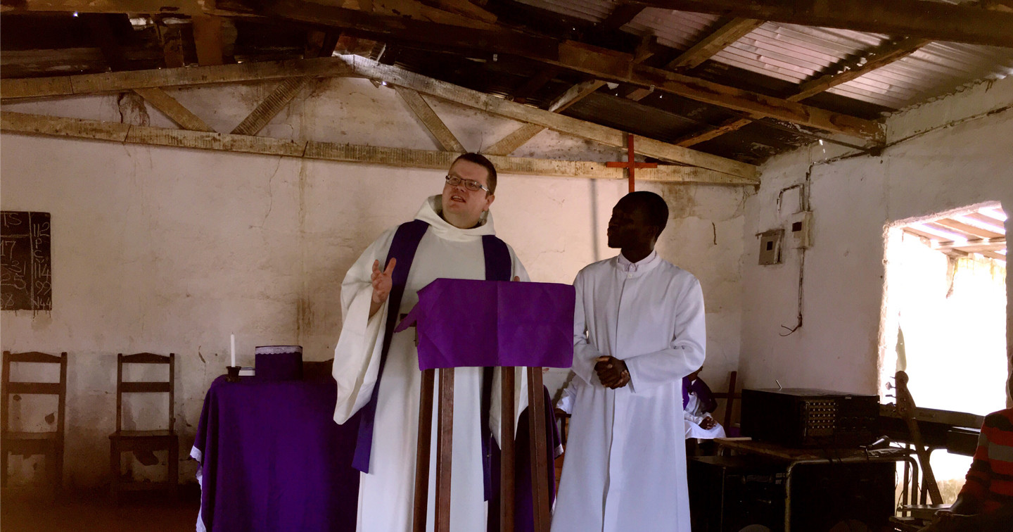 Revd Adrian Dorrian preaching in St Luke’s, Luangwa. The translator is Mofya, a student at the seminary.
