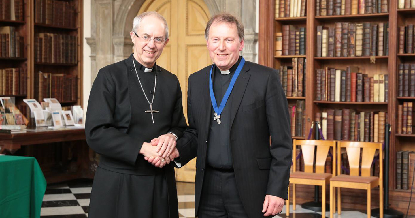 The Rev John Mann, right, former Dean of Belfast, with the Archbishop of Canterbury, the Most Rev Justin Welby, following the presentation of The Lambeth Cross.