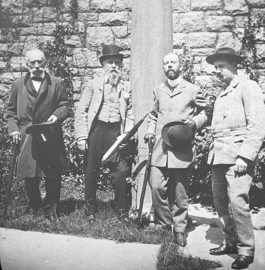 Here we see four people posing. From the left we have Dr Thomas Addis Emmet, James Franklin Fuller, an unidentified gentleman who appears in other photographs, and a person on the far-right who is also unidentified. It is possible that this person is Francis Joseph Bigger (1863-1926), a member of the Royal Irish Academy and Fellow of the Royal Society of Antiquaries of Ireland, as well as the editor of the revived Ulster Journal of Archaeology. Dr Emmet mentions that Mr Bigger ‘facilitated' during the excavations at St Peter's Church. The picture certainly reveals a very official group of people.