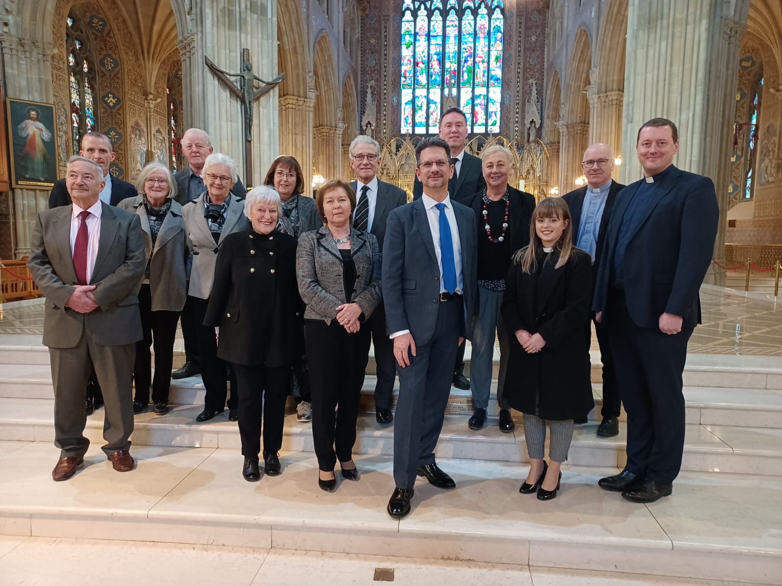 The Minister with clergy, members of the Cathedrals' Partnership and other local representatives including the Very Revd Peter McAnenly (Administrator of St Patrick's RC Cathedral) and the Very Revd Shane Forster (Dean of Armagh).