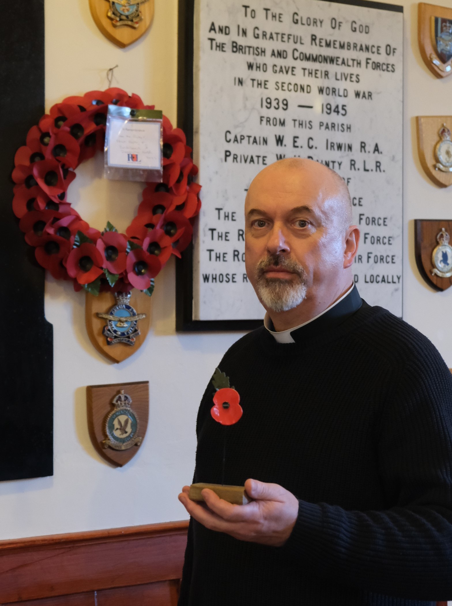 Archdeacon Paul Thompson, Rector of Derryvullan North Parish Church, Irvinestown, with the special poppy made from medal from a crashed Catalina Flying Boat, which will be on display on Remembrance Sunday.