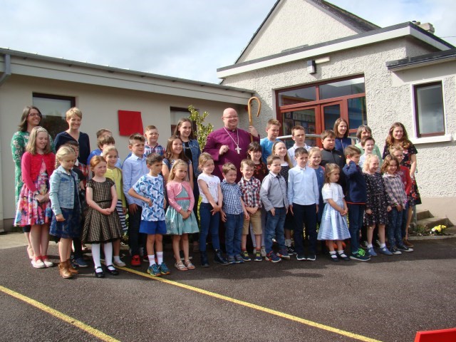 All the children and staff of Ballymoney National School with the Bishop.