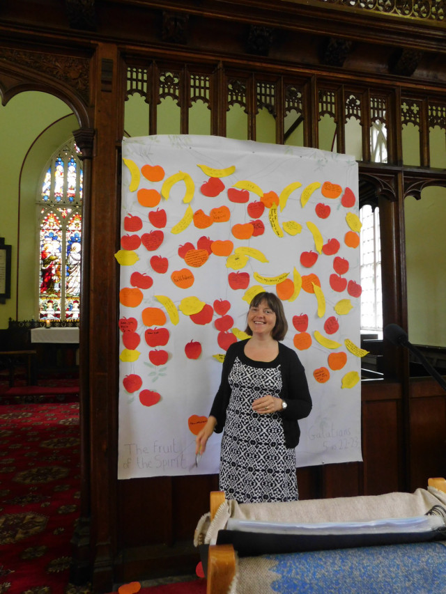 Linda Deane with the ‘Fruits of the Spirit' display.