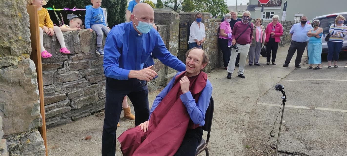 Former Wicklow sheep farmer and now Rector of Kilgariffe Union of Parishes in County Cork – the Reverend Kingsley Sutton – ‘shears' parishioner Geoffrey Hanbidge in aid of essential conservation work on the Church of the Ascension, Timoleague, County Cork.