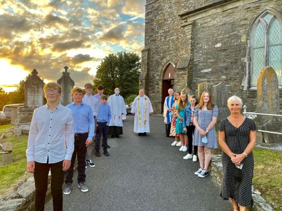 Confirmation candidates of Kilgariffe Union with the Rev. Kingsley Sutton and their Bishop, Dr Paul Colton.