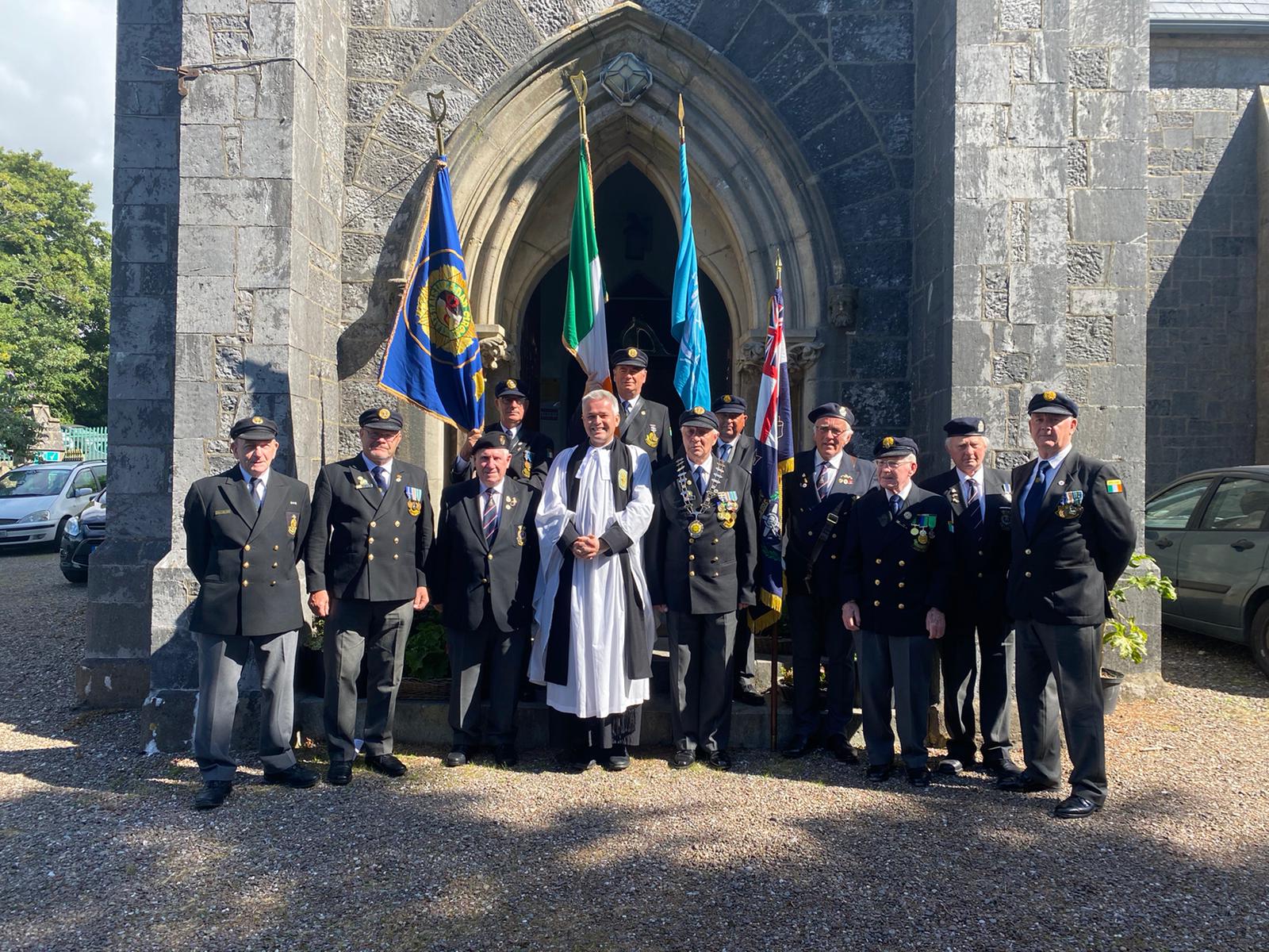 The Revd Canon Paul Arbuthnot, Rector of Cobh and Glanmire Union of Parishes with representatives of Cobh ONE and the Royal Naval Association at Christ Church, Rushbrooke.