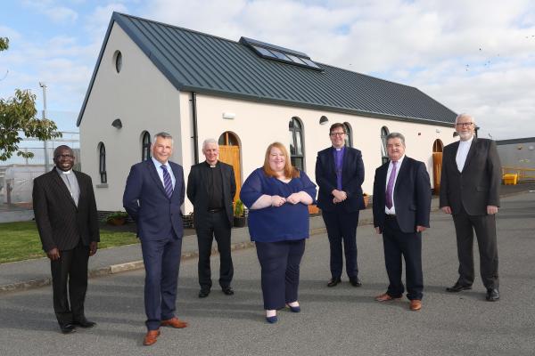 Justice Minister Naomi Long is pictured at the official opening of the new House of Worship at Magilligan Prison with (front, l-r) Gary Milling, Governor of Magilligan Prison, and Ronnie Armour, Director General of the Northern Ireland Prison Service, and (back row, l-r) Rev Dr Sahr Yambasu, President of the Methodist Church, Fr Michael Canny, Vicar General of Derry Diocese, Rev Andrew Forster, Church of Ireland Bishop of Derry and Raphoe, and Rev David Bruce, Moderator of the Presbyterian Church.