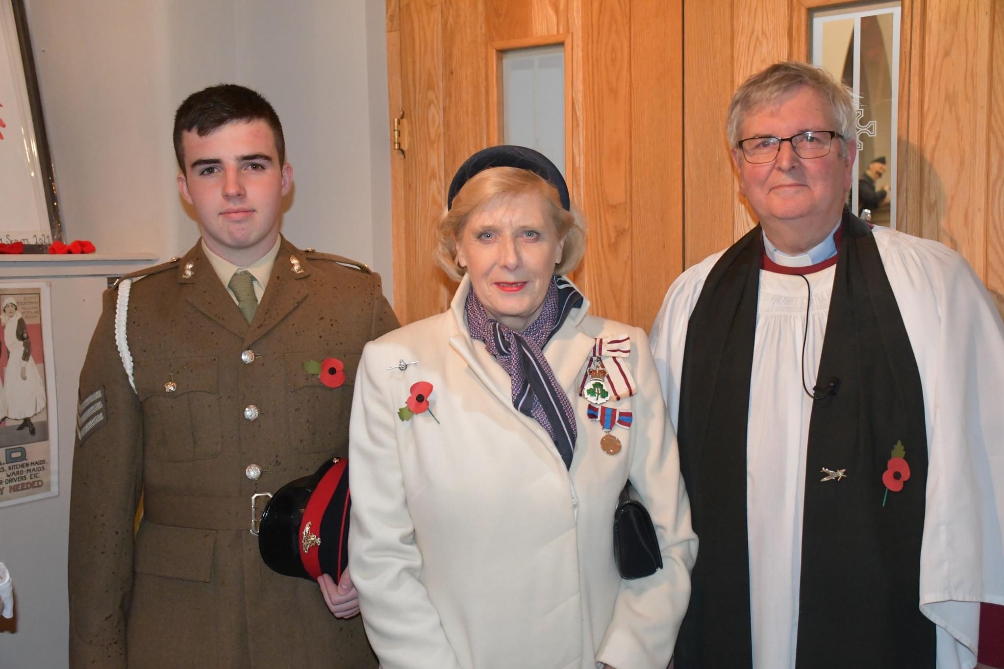 Cadet Chris Johnston with the Lord-Lieutenant and Canon Given.
