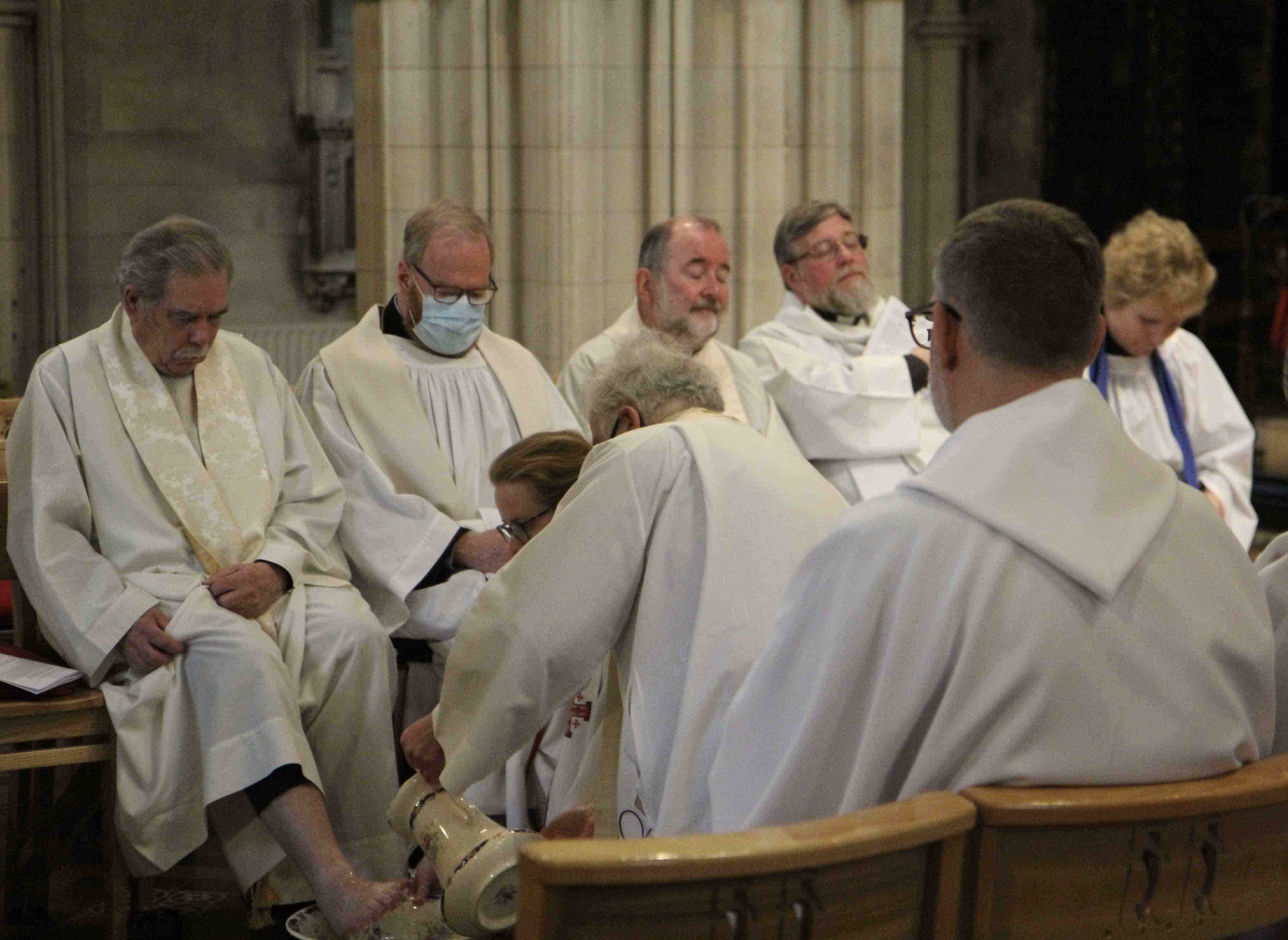 The Archbishop washes the feet of the Revd Terry Lilburn on Maundy Thursday.