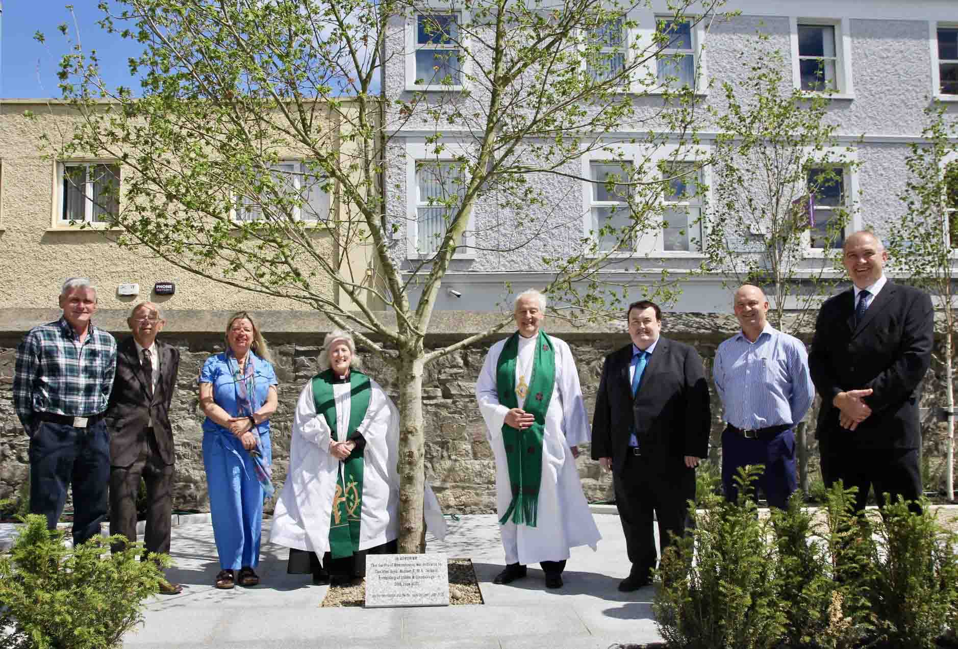 Members of the Rathfarnham parish Garden of Remembrance Subcommittee with Archbishop Michael Jackson, Canon Adrienne Galligan and Minister Colm Brophy.