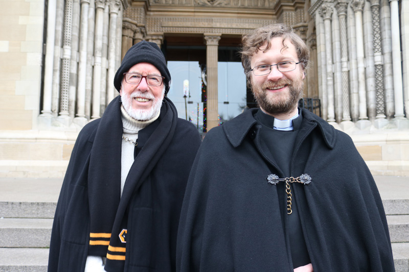 Lay Canon Mr Robert Kay, who is doing his first Black Santa Sit-out, with Dean's Vicar Canon Mark Niblock.