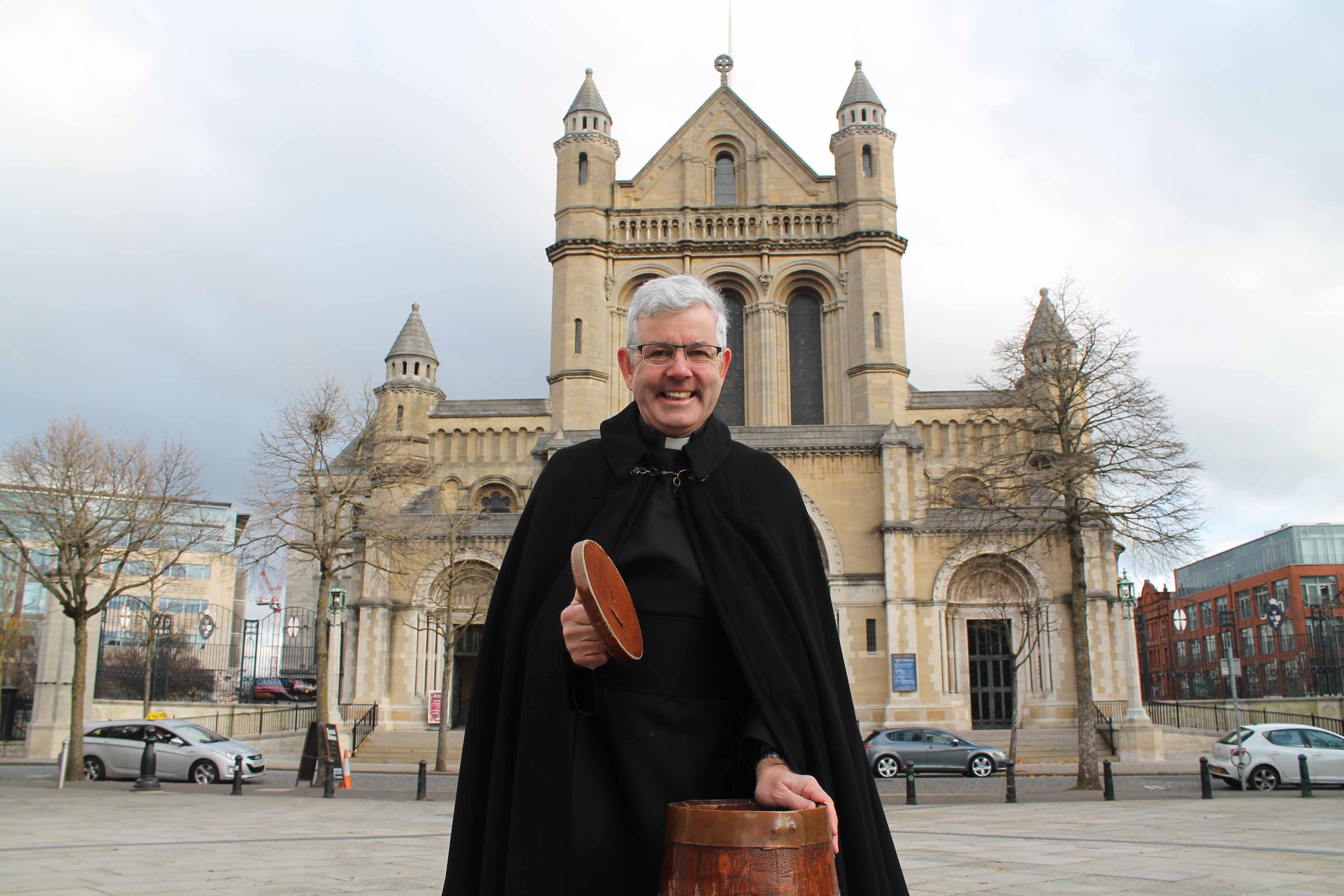The Dean of Belfast, the Very Rev Stephen Forde, prepares for his first Black Santa Sit-out gets underway at Belfast Cathedral on December 17.