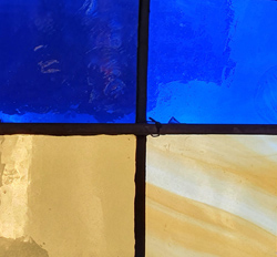 The colours of Ukraine, reflected in a window in the Chapel of Unity at Belfast Cathedral.