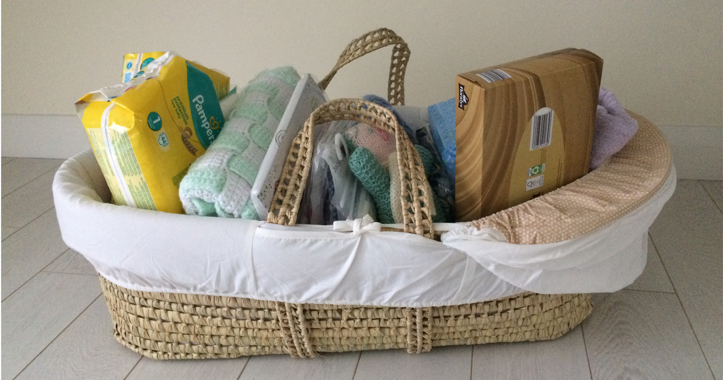 Baby Basics are delivered to families in a Moses basket or similar container stocked with essential items, including nappies and wipes.