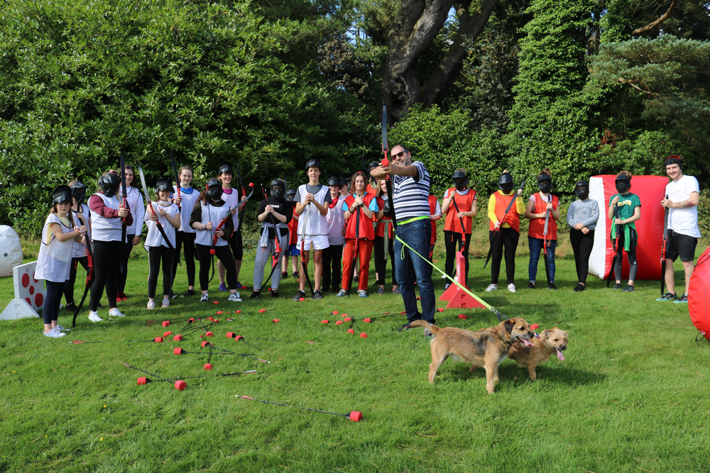 The Archdeacon of Belfast, the Ven George Davision, tried his hand at soft arrow combat during the Connor youth weekend at Castlewellan Castle.