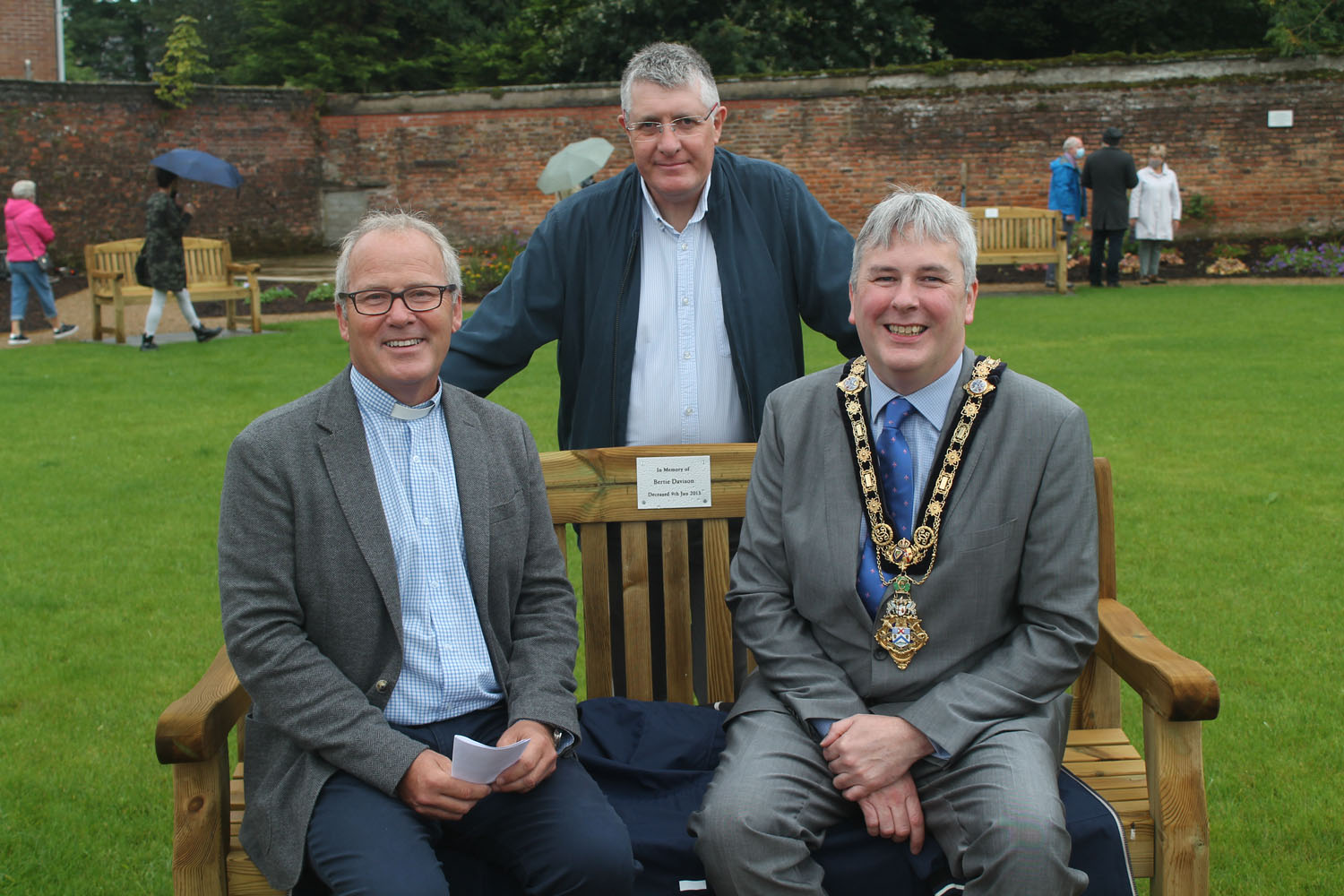 The Rev Andrew Sweeney, rector of Ballymoney, Finvoy and Rasharkin, the Mayor of Causeway Coast and Glens, Councillor Richard Holmes, and David Goodman, Warden of the Quiet Garden, at the official opening of the garden.