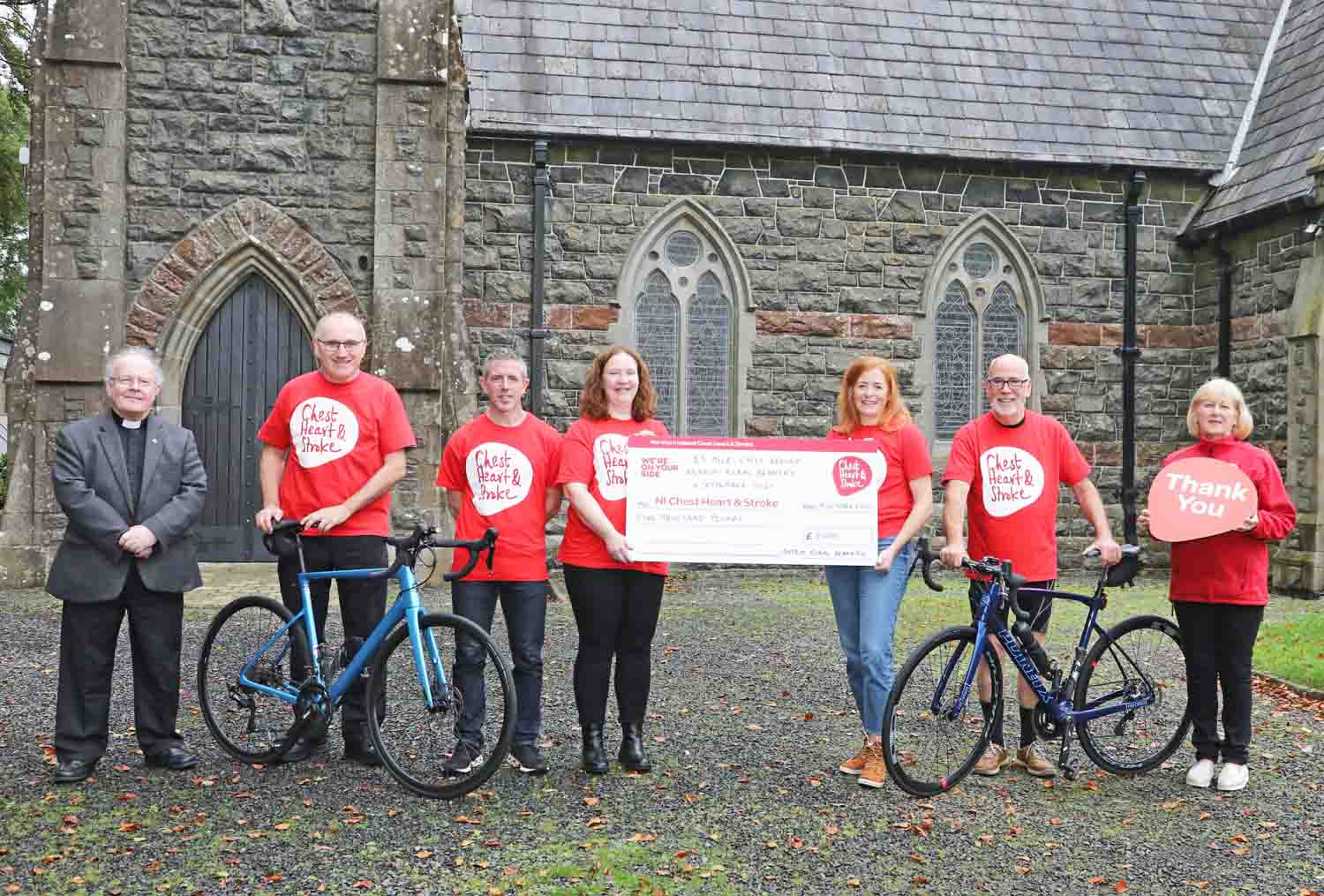 At the presentation of funds raised by the Antrim Rural Deanery sponsored cycle are, from left: The Rev Canon David Humphries (rector of Kilbride Parish), David Holmes (Kilbride), Simon Wells, Yvey Wells and Lisa Holmes (all Christ Church, Ballynure), Peter Gates (All Saints', Antrim) and Valerie Saunders from NI Chest, Heart and Stroke.