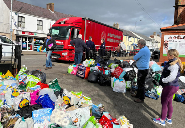 Supplies collected by the Parish of Christ Church and St John, Ballyclare, and destined for the Polish border with Ukraine are loaded into lorries in Ballyclare.