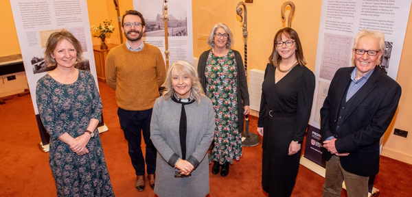 At the launch of the exhibition on March 8 celebrating the 150th anniversary of St Matthew's, Shankill, are, from left: Prof Olwen Purdue, Professor of Social History at Queen's University; Researcher Sam Guthrie; The Rev Tracey McRoberts, rector of St Matthew's; Heather Stanley of PRONI; Prof Nola Hewitt-Dundas, Queen's Pro-Vice-Chancellor and Jackie Redpath of the Greater Shankill Partnership. (Photo: QUB)