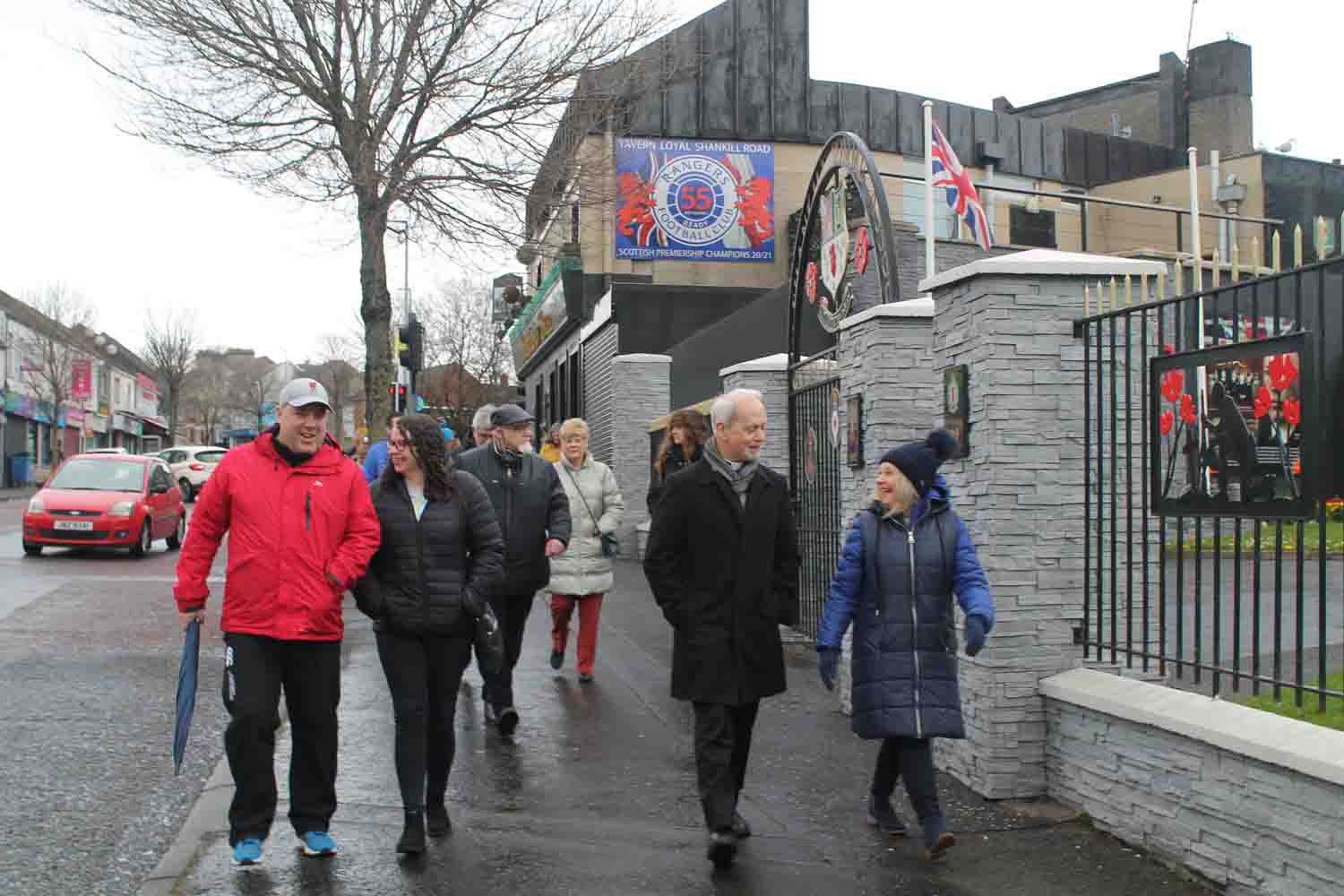 The Rev Tracey McRoberts, right, leads a prayer walk along Belfast's Shankill Road on April 8.