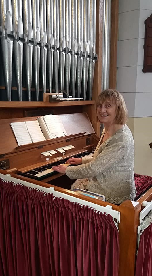 Rosemary Steele BEM at the organ of St John's Parish Church, Stoneyford.