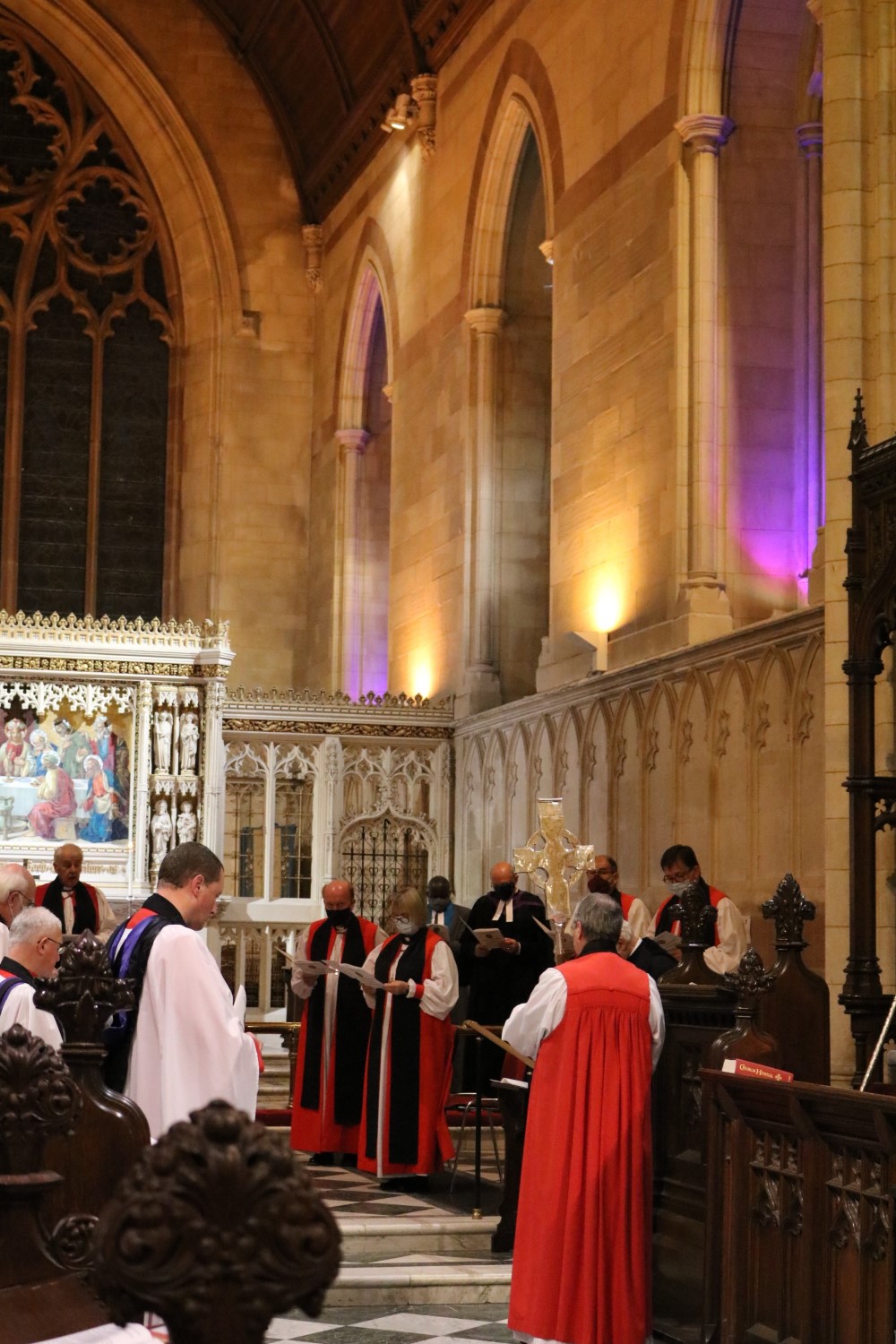 The Most Revd Dr Michael Jackson, Archbishop of Dublin, presents the Metropolitan Cross to Archbishop John McDowell.