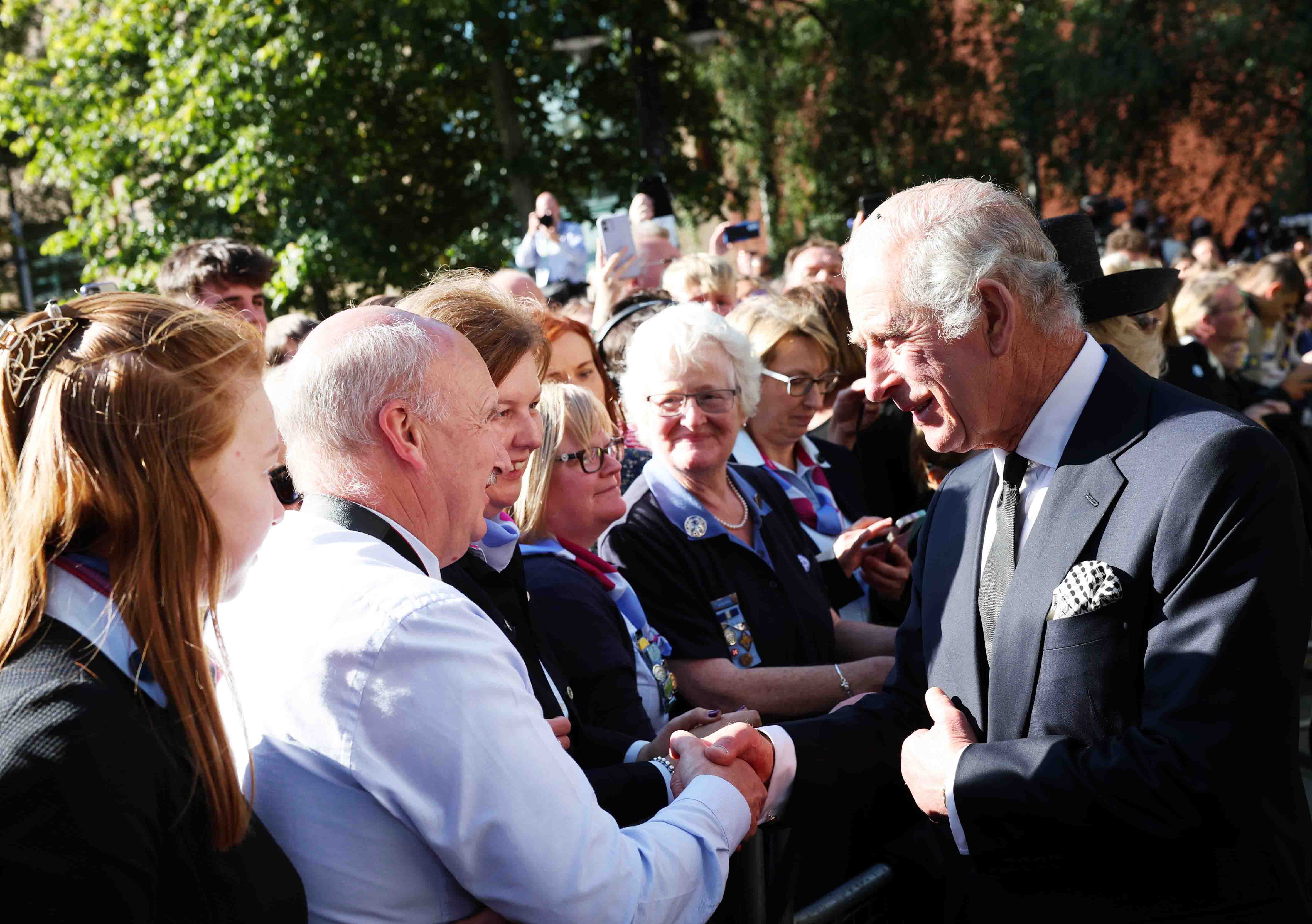 The King meets with well-wishers when visiting Belfast for the Service of Reflection and Thanksgiving for the Life of Queen Elizabeth II, September 2022.  Photo credit: Kelvin Boyes/PressEye.