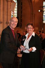 Archbishop of Armagh presents Taney Parish magazine prize winner
