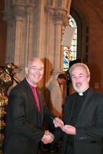 Archbishop of Armagh presents a runner up magazine prize winner